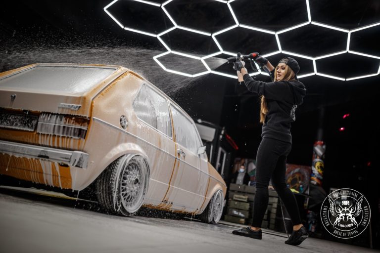 Application of active foam by RRCustoms on a tuned vw golf by an attractive model