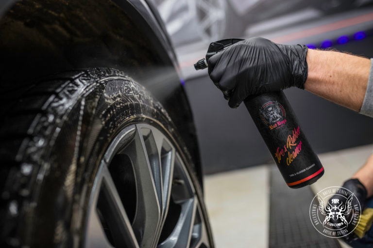 Cleaning a tire with BadBoys Tire & Rubber Cleaner